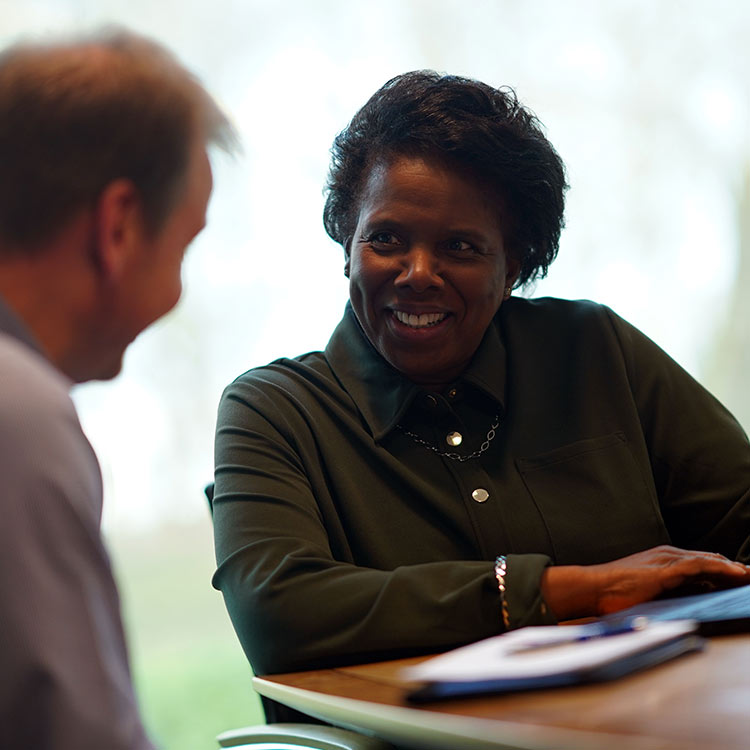 A new business owner talking to a business support specialist